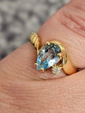 1.49CT. Pear Cut Blue Topaz and Diamond Ring in 14kt Yellow Gold, Size 7