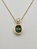 Green Sapphire and Diamond Pendant Necklace in 14k Yellow Gold