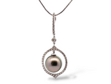 white gold diamond and pearl pendant