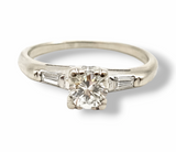 14kt white gold round diamond and baguette engagement ring
